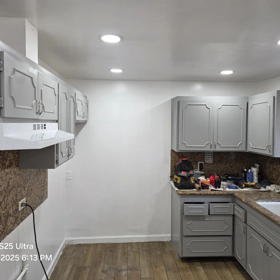 Repainted gray cabinets, finished